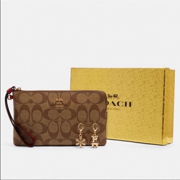 Coach Handbags - New Coach Signature Large Wristlet with Charms in a Gift Box